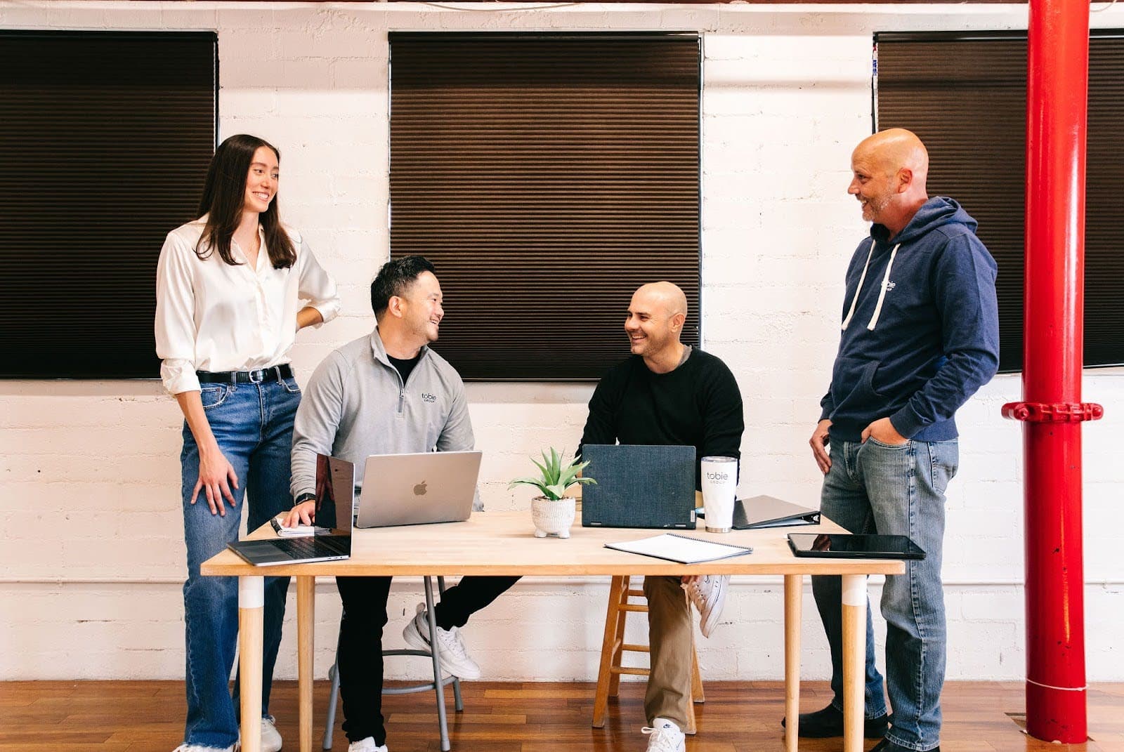 Ryan Burch with team members in Tobie Group’s Tempe office