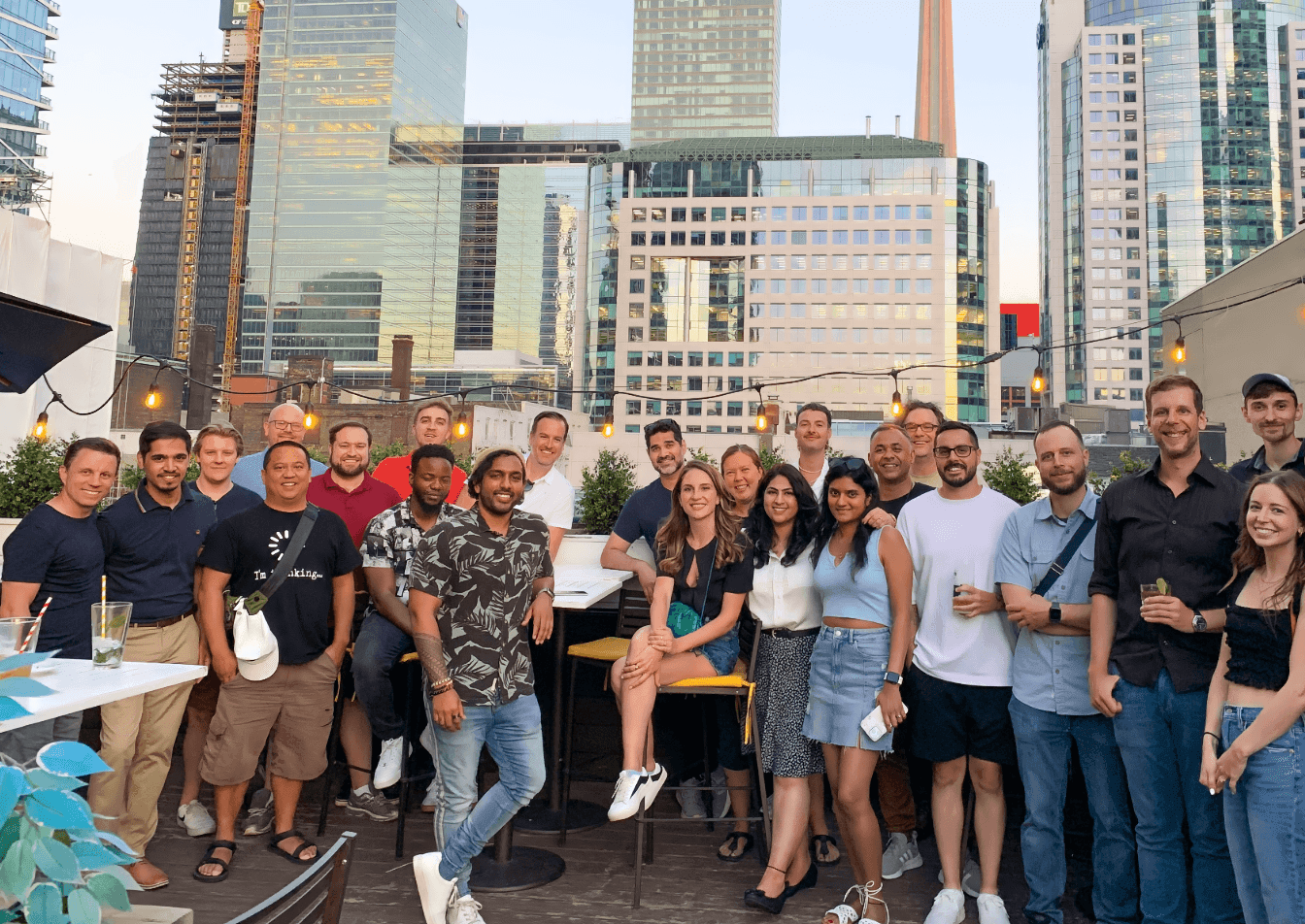 Group shot of 23 team members from AgencyAnalytics
