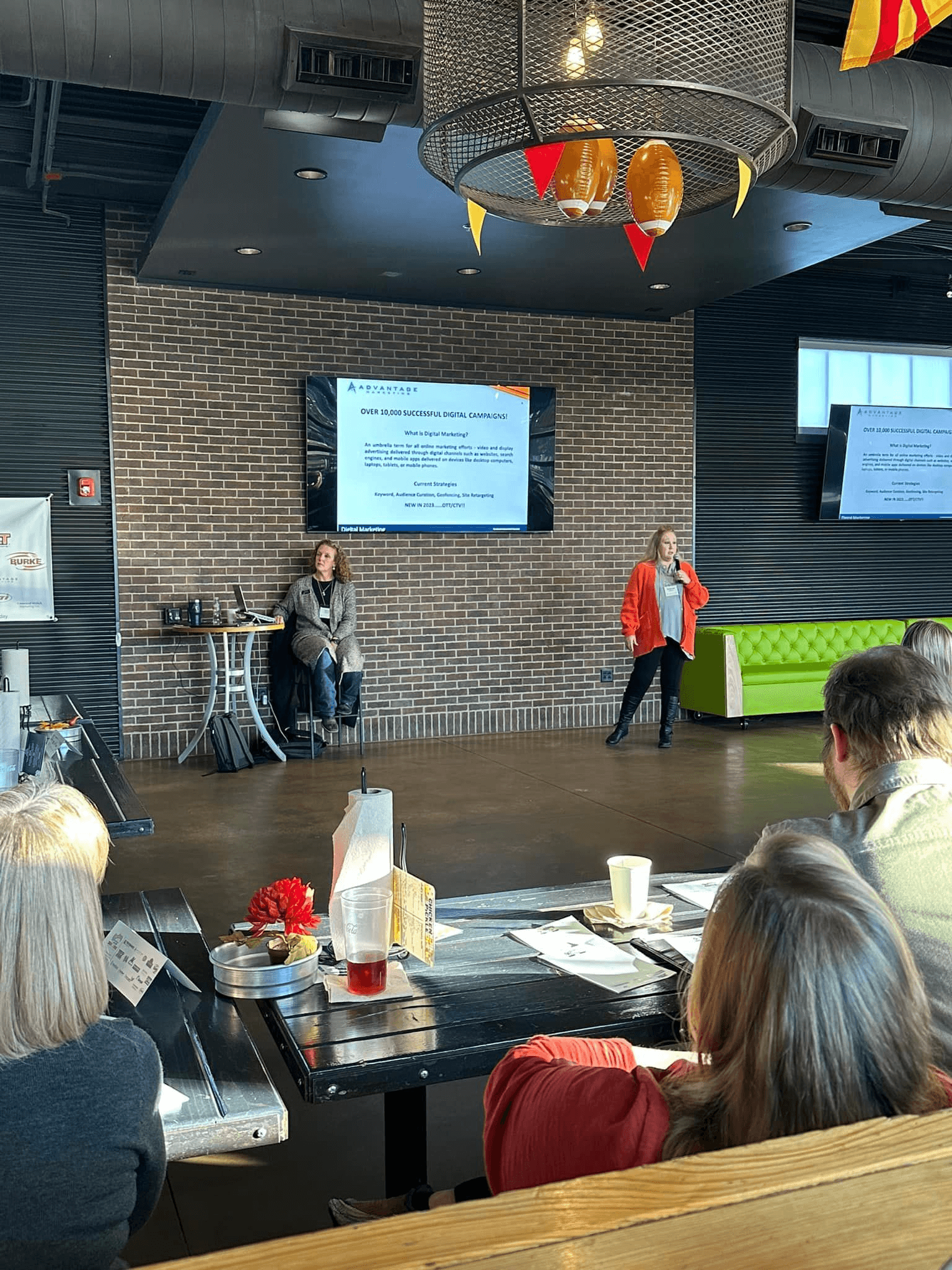 Amy Hoefer, VP/Co-owner, and Amanda Simons, Digital Manager/Media Buyer, at a local franchise event in Wichita, Kansas Amy Hoefer, VP/Co-owner, and Amanda Simons, Digital Manager/Media Buyer, at a local franchise event in Wichita, Kansas