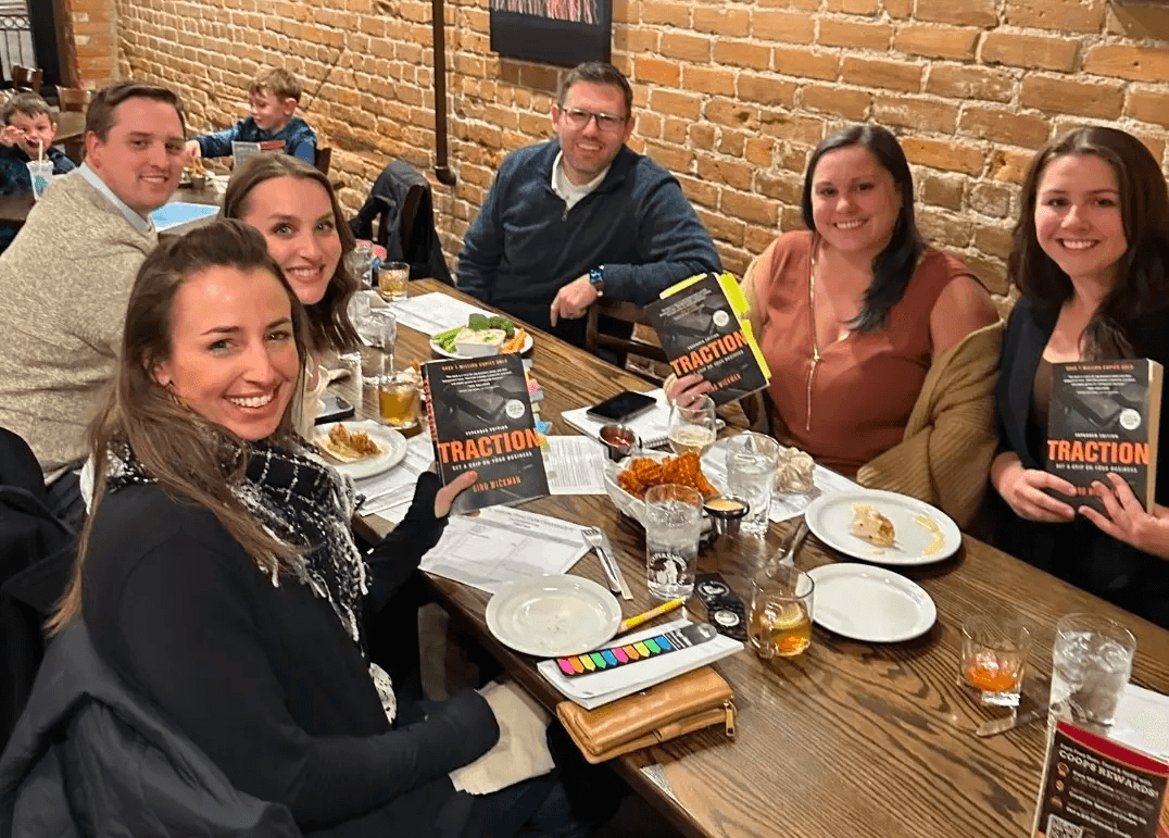 The OTM team hosting a book club reading Gino Wickman’s Traction, a guide to EOS.
 The OTM team hosting a book club reading Gino Wickman’s Traction, a guide to EOS.