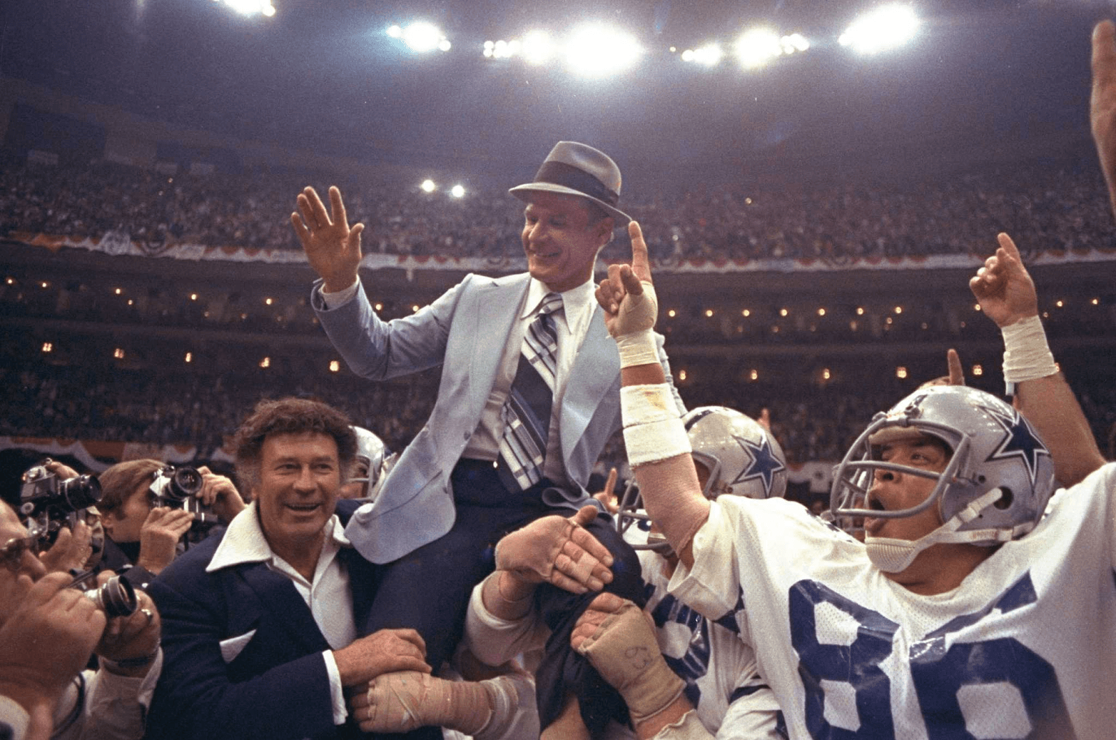 Always calm and composed—and wearing his signature hat—Tom Landry led the Dallas Cowboys to victory with strategic brilliance. (Credit: Associated Press) Always calm and composed—and wearing his signature hat—Tom Landry led the Dallas Cowboys to victory with strategic brilliance. (Credit: Associated Press)