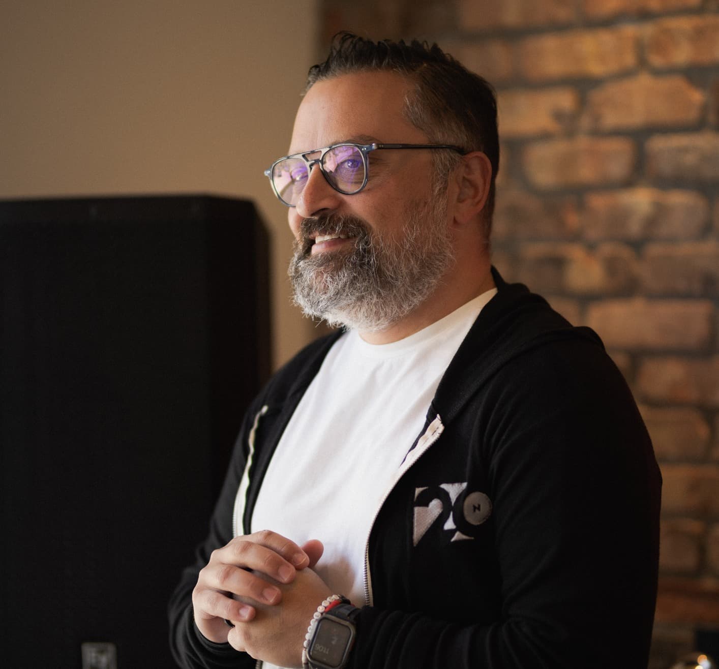 George Arabian, CEO of NVISION, speaking during a team strategy session at the agency's office. George Arabian, CEO of NVISION, speaking during a team strategy session at the agency's office.